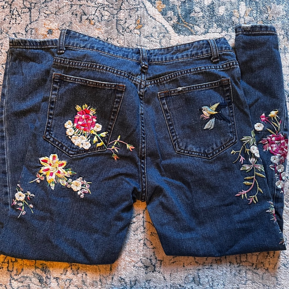 Embroidered floral jeans with birds